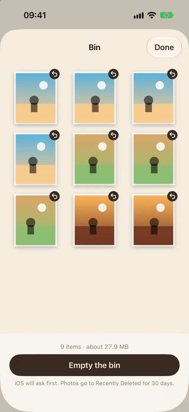 The bin: nine photos ready to go, each with a button to take it back out, and Empty the bin, which iOS asks about first