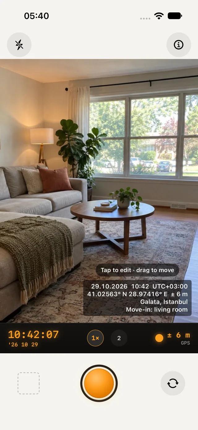 Timestamp Cat: the viewfinder on a living room with the live stamp, "29.10.2026 10:42 UTC+03:00", the coordinates ± 6 m, "Galata, Istanbul" and "Move-in: living room", over the amber clock and the shutter
